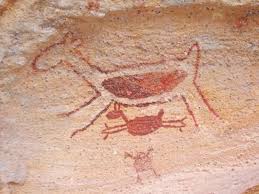 Imagem icônica que representa o Parque Nacional Serra da Capivara no Piauí. Na imagem mostra o que parece ser uma capivara dando a luz e tal fato sendo contemplado por um indivíduo.